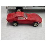 Vintage 1970's Tonka Pressed Steel Toy Car Carrier with Yellow and Red Corvette Cars Vintage 1970's Tonka Pressed Steel Toy Car Carrier with Yellow and Red Corvette Cars