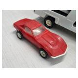 Vintage 1970's Tonka Pressed Steel Toy Car Carrier with Yellow and Red Corvette Cars Vintage 1970's Tonka Pressed Steel Toy Car Carrier with Yellow and Red Corvette Cars