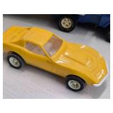 Vintage 1970's Tonka Pressed Steel Toy Car Carrier with Yellow and Red Corvette Cars Vintage 1970's Tonka Pressed Steel Toy Car Carrier with Yellow and Red Corvette Cars