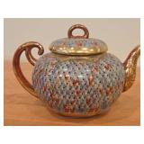 Japanese Thousand Faces Porcelain Tea Pot