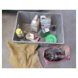 Plastic tote of automotive fluids, ... Plastic tote of automotive fluids, ...