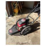 Craftsman 22-inch walk-behind gas weed trimmer.