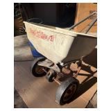 Red Devil broadcast spreader and a Hudson 2-gallon pump-less sprayer.