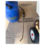 Red Devil broadcast spreader and a Hudson 2-gallon pump-less sprayer.