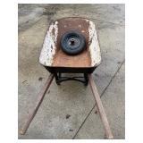 Classic Wheelbarrow with extra wheel and rim.