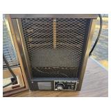 Two vintage Arvin space heaters.