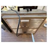 Two vintage Arvin space heaters.