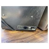 Two vintage Arvin space heaters.