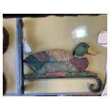 Various wall decorations and bird feeder