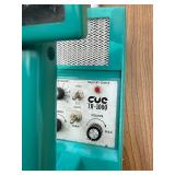 Vintage "The Discriminator" metal detector manufactured by Compass Electronics.