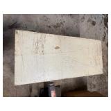 Wood box with electrical cords, battery tender and power strip.