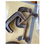 Box of various tools, grinding wheel, c clamps and more