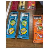 5 Gallon job site bib and various hooks and tools.