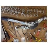 Box of tools including a come along and various hardware ect