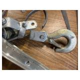 Box of tools including a come along and various hardware ect