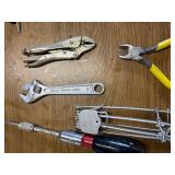 Box of tools including a come along and various hardware ect