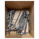 Bits, pipe insulation, grass clipper , screw drivers