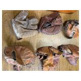 Lot of vintage baseball gloves.