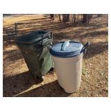 Two Rubbermaid garbage containers