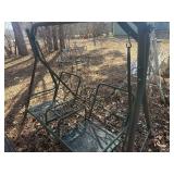 metal patio swing in green , in decent shape