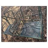 metal patio swing in green , in decent shape