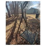 metal patio swing in green , in decent shape