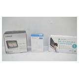 NEW Garmin nuvi 1400 series (complete, NEW); secrui door chime (used, complete); NEW Anti-Tip Furniture TV Safety Straps (complete)