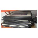 All contents on the middle Pallet Racks which includes 20 pieces of Picture Frames and assorted contents)