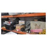 Contents of the First Pallet Rack ( it includes a heavy-duty safe that we can't figure our tge combination  and assorted Contents which includes two treadmills motors)