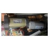 Contents of the First Pallet Rack ( it includes a heavy-duty safe that we can't figure our tge combination  and assorted Contents which includes two treadmills motors)