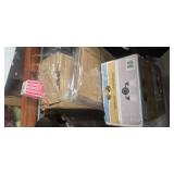 Contents of the First Pallet Rack ( it includes a heavy-duty safe that we can't figure our tge combination  and assorted Contents which includes two treadmills motors)