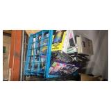 Contents of the First Pallet Rack ( it includes a heavy-duty safe that we can't figure our tge combination  and assorted Contents which includes two treadmills motors)