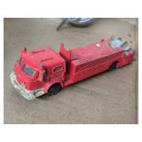 Vintage Headlight, Toy Fire Truck, Gas Cap with Key, and Tape Measure