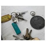 Box of Assorted Keys, Shoe Hanger, and Miscellaneous Items.