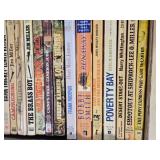 Box of Western Novels including Mack Bolan, Max Brand, and Elmer Kelton Books