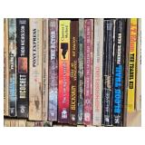 Box of Western Novels including Mack Bolan, Max Brand, and Elmer Kelton Books