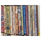 Box of Western Novels including Mack Bolan, Max Brand, and Elmer Kelton Books