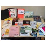 Collection of Farm and Equipment Manuals and Brochures including International Harvester Shop Manual and Husqvarna Chainsaw Manual