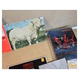 Collection of Farm and Equipment Manuals and Brochures including International Harvester Shop Manual and Husqvarna Chainsaw Manual