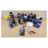Various Opened and Used Automotive Fluids and Adhesives Including Liquid Wrench Lubricating Oil, PB Blaster Penetrating Catalyst, and Gojo Hand Cleaner