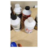 Automotive Fluids and Maintenance Supplies including Marvel Air Tool Oil, STP Power Steering Fluid, and Assorted Greases and Oils - Many Open and Used