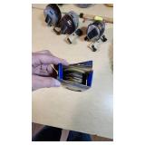 Fishing Equipment Lot including Zebco Reels, Fishing Line, and Accessories