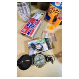 Camping and Survival Gear with Canteens, Compass, Matches, and Cookware