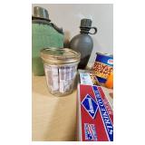 Camping and Survival Gear with Canteens, Compass, Matches, and Cookware