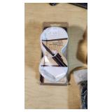 Gun cleaning supplies including Ballistol, Break-Free CLP, rods, and patches, plus assorted hardware pieces and tools