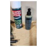 Gun cleaning supplies including Ballistol, Break-Free CLP, rods, and patches, plus assorted hardware pieces and tools