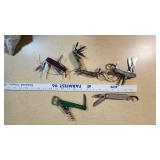 Lot of Multi-Tool Knives including Swiss Army and Heineken Branded Items