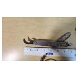 Lot of Multi-Tool Knives including Swiss Army and Heineken Branded Items