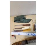 Assorted Tools and Camping Gear including Multi-Tool Ax, Knives, and Camping Accessories