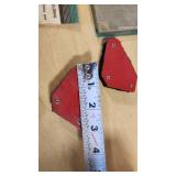 Various Welding Tools and Accessories including Magnetic Holders, Flint Lighter, and Welding Lenses